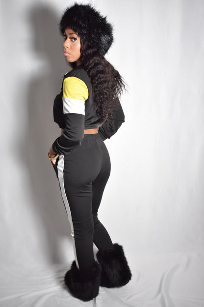 Black retro y2k tracksuit color block with yellow and white accents, brown faux fur boots, brown jumbo faux fur headband, two piece outfit set