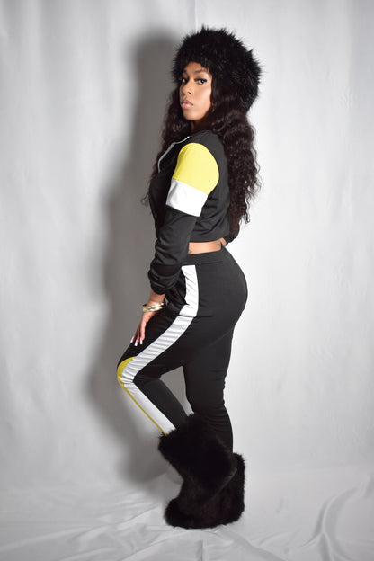 black retro y2k tracksuit color block with yellow and white accents, brown faux fur boots, brown jumbo faux fur headband, two piece outfit set